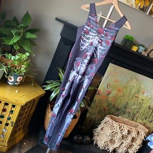 Women’s Small skull Body suit NWOT